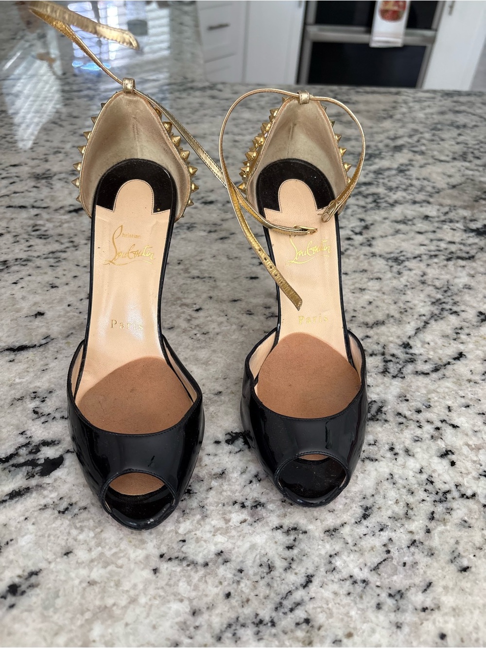Christian Louboutin Black Patent Peep-Toe Heels with Gold Ankle Straps and Studs